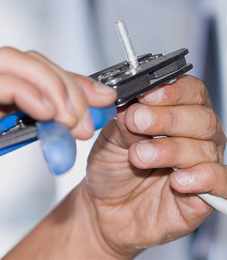 Technician performing structured cabling work
